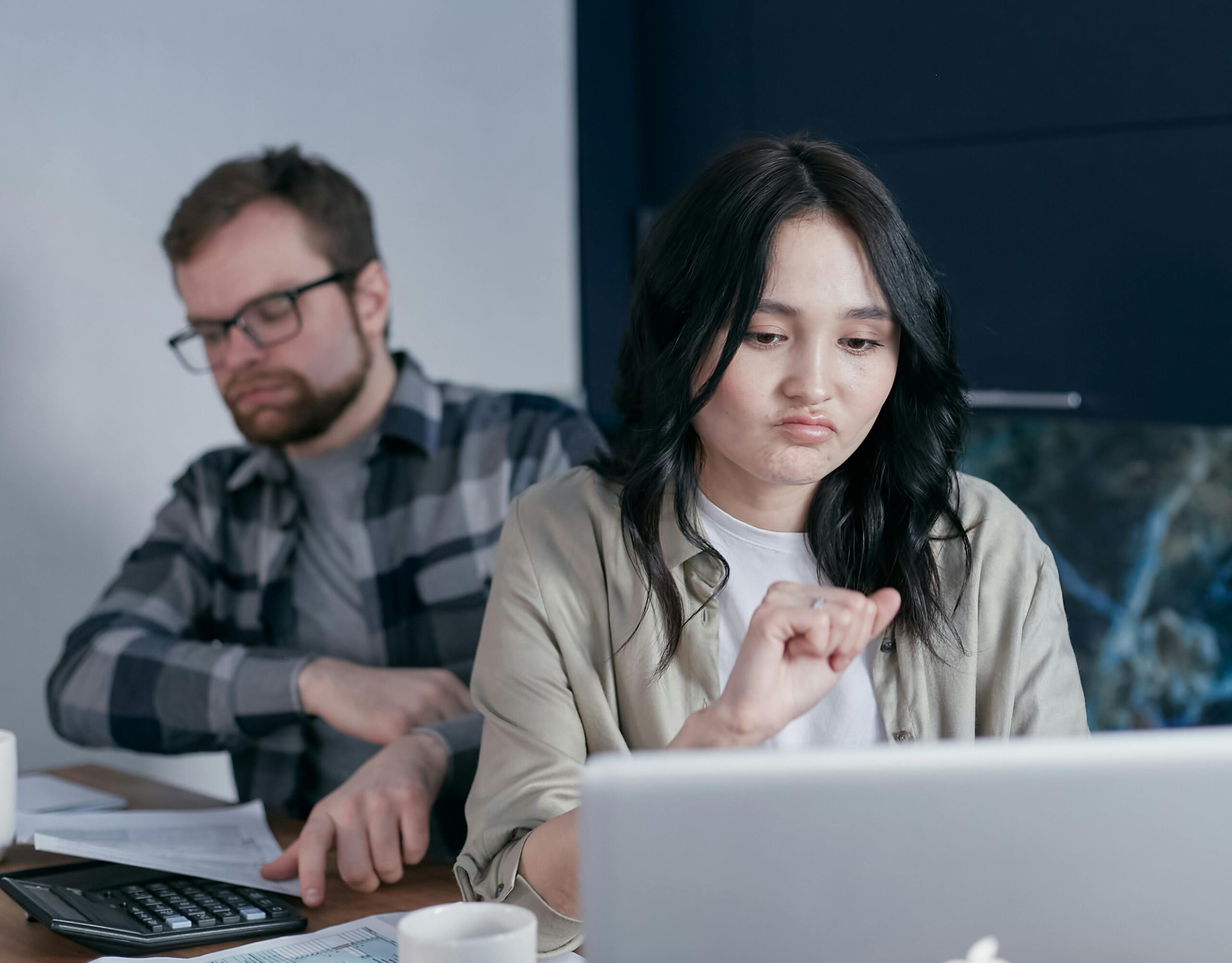 Couple stressed while reviewing loan documents at home — low CIBIL score India