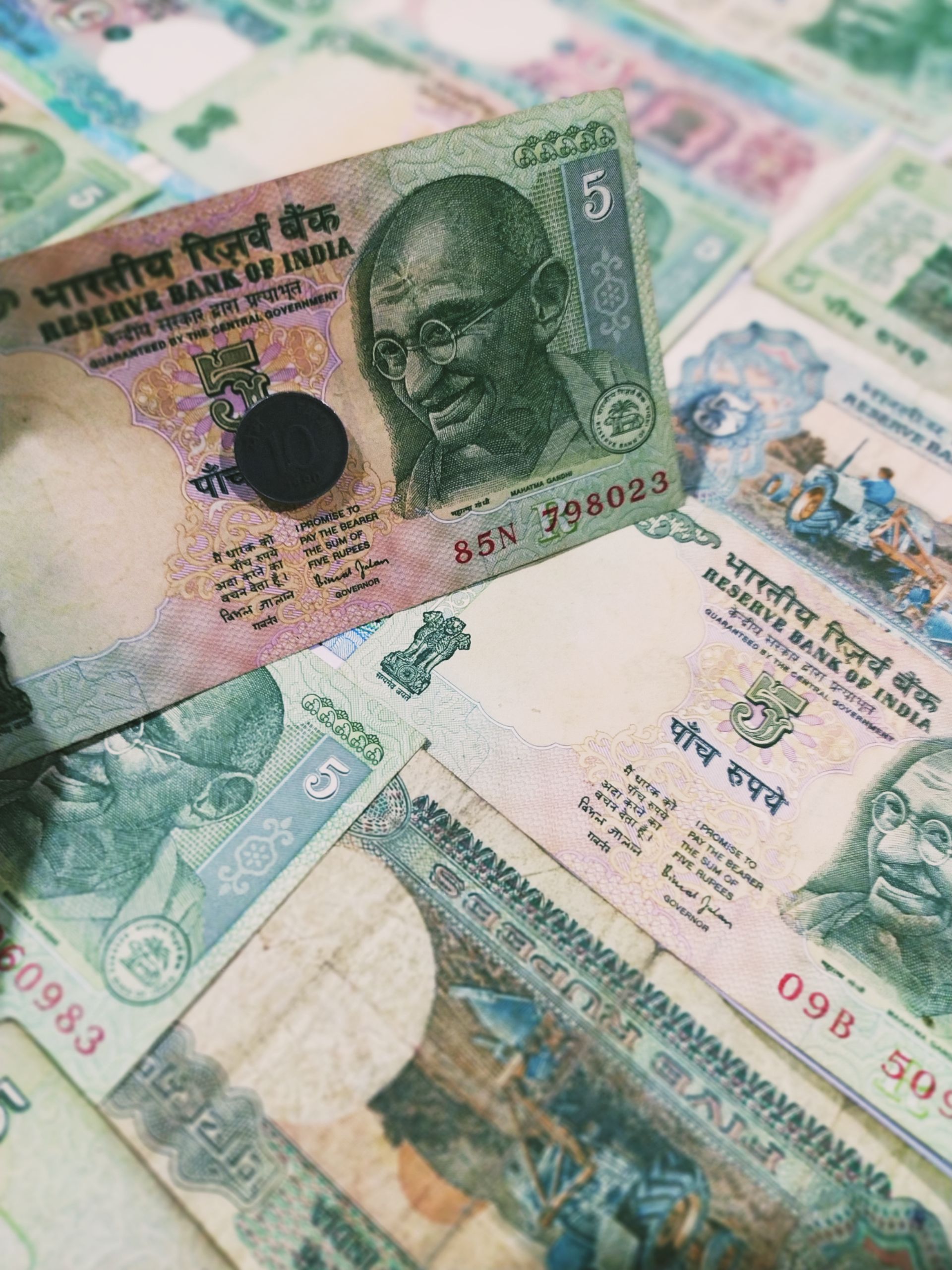 Indian rupee banknotes — the reality of loan debt and financial stress in India